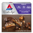 Box of Atkins Endulge Pecan caramel clusters. Rich in fiber with 2g net carbs and 2g sugar.